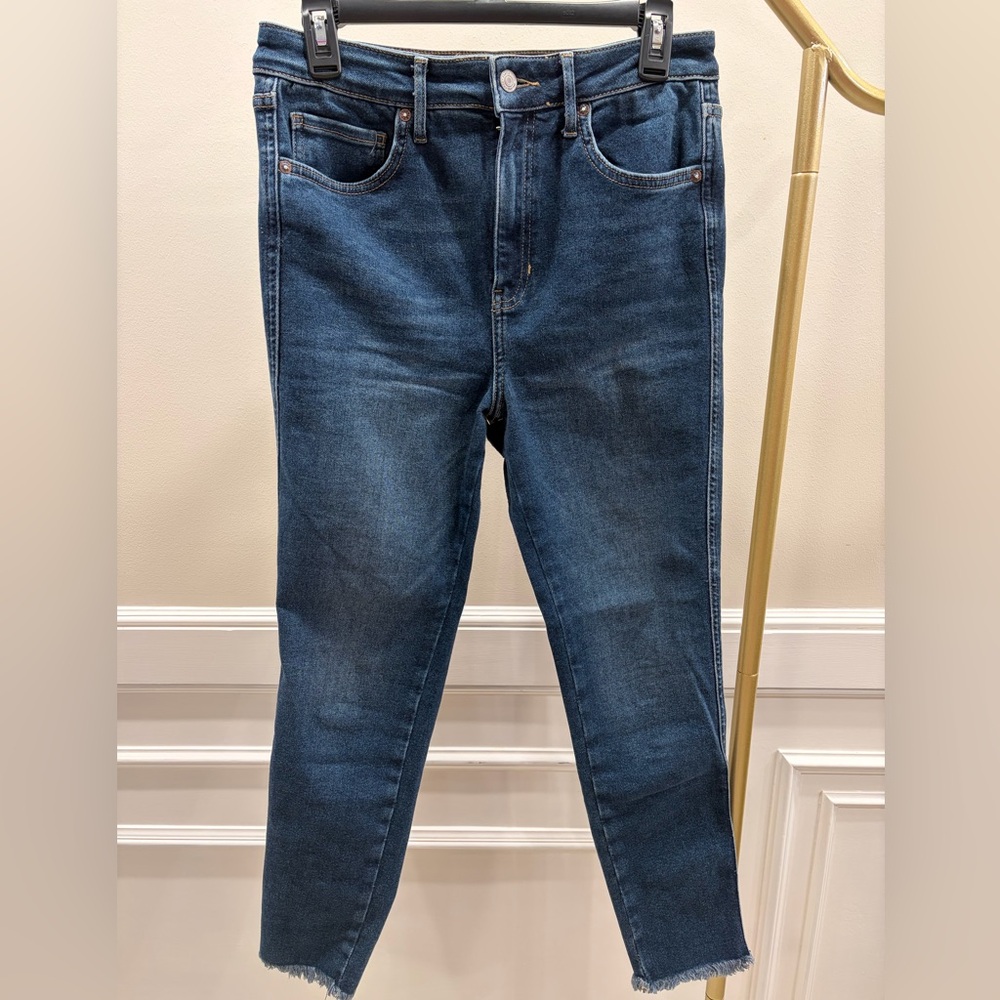 We the Free Women's Cropped Raw Hem Dark Blue Jeans Size 31 with 27” Inseam.
